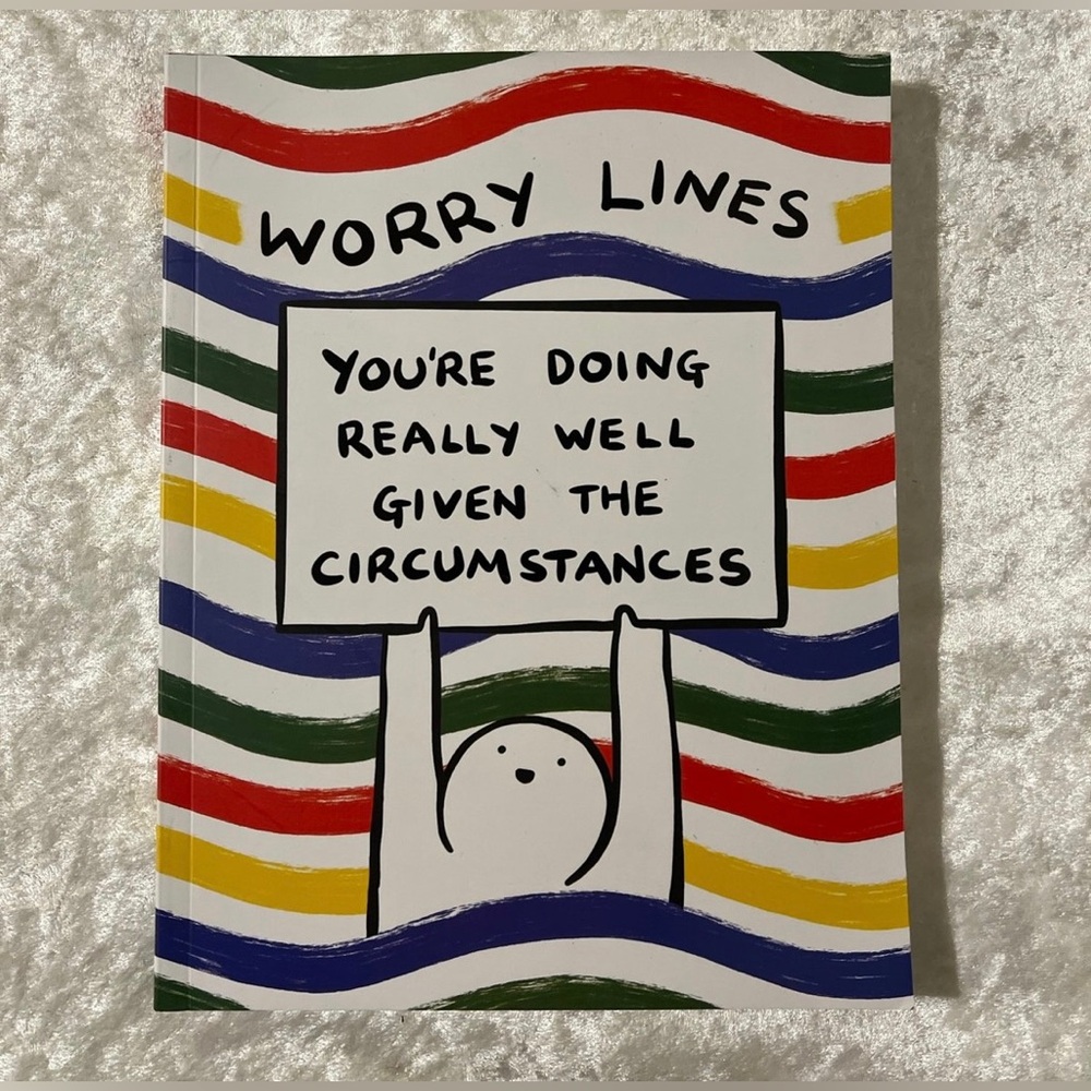 Inspirational Book with Multicolor Waves